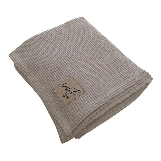 Памучно вафлено одеяло в бежов цвят Памучно вафлено одеяло в бежов цвят